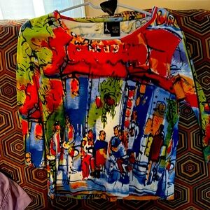 Women’s size medium Zaskin shirt. Beautiful colors..